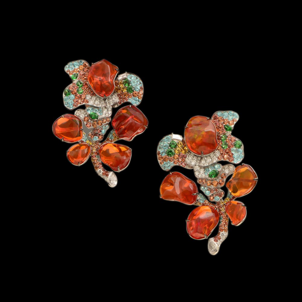 Pair of white gold earrings. Fire opals, Paraiba tourmalines, orange sapphires, tsavorites, diamonds, Emil Weis Opals